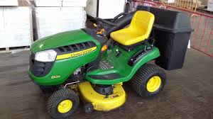 Quite a few extras including rear vision mirror, rear safety light and front bumper. John Deere Ride On Mower Model D120 With Catcher With Book Key Tag 30