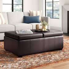 Twin leather sofas are matched by button tufted twin ottomans with hardwood frames, centered around large black. Three Posts Fordbridge 47 6 Wide Faux Leather Tufted Rectangle Cocktail Ottoman With Storage Reviews Wayfair