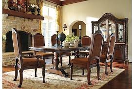 Breakfast, lunch and dinner will be that much more classy when eating at this table. The North Shore Dining Room Chair From Ashley Furniture Homestore Afhs Com A Deep Rich Stained Fini Dining Room Table Set Dining Room Table Dining Room Sets