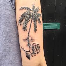 50 Superb Palm Tree Tattoo Designs And Meaning Palm Tattoos Palm Tree Tattoo Tattoo Designs And Meanings