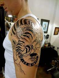 The 12 Best Half Sleeve Tattoos Tiger Tattoo Designs Petpress Half Sleeve Tattoo Sleeve Tattoos Tattoo Designs Men