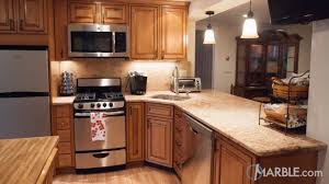 This Traditional Kitchen With Oak Wooden Cabinets And A Butcher S Block Island Is Beautiful Replacing Kitchen Countertops Kitchen Countertops Wooden Cabinets