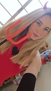 Here's who I'll be cosplaying this year. It's Charlie from Hazbin hotel.  I'm very excited to dress like her this. She so much fun and I can't wait  to see you guys