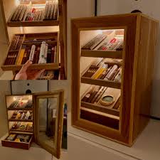 If you're not very handy in the garage, then take an old wood box and repurpose it. Recently Finished My Humidor Cabinet Cigars