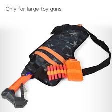 We have a whole freakin toy gun arsenal. Greensen Thicken Storage Bag Back Holster Adjustable Belt For Tactical Nerf Toy Gun Shoulder Bag For Gun Back Holster Walmart Com Walmart Com