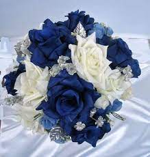 The materials that make up the fake wedding flowers are foam, plastic, silver, satin, and silk. 21pc Bridal Bouquet Wedding Flowers Navy Ivory Silver Ebay Blue Wedding Flowers Navy Wedding Flowers White Wedding Bouquets