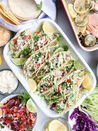 Once the fish is on, let it cook most of the warm the tortillas on the grill. Salmon Tacos W Fresh Salsa Avocado Sauce Cilantro