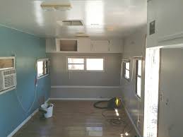 The Trailer Was Already Converted Into An Open Floor Plan This Pic Shows Old Laminate Flooring And Old Paint Job Trailer Remodel Open Floor Plan Remodel
