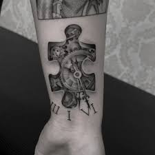 Black And White Puzzle Piece Tattoo 