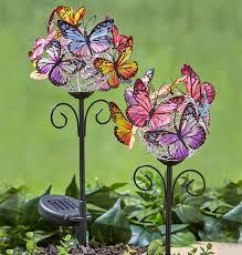 The frosted finish of these solar stake lights makes for a chic display that's ideal for illuminating front gardens and pathways. Set Of 2 Solar Butterfly Garden Stakes Fresh Finds