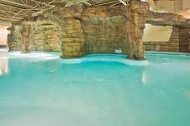 The Indoor Lazy River Is Heated And Open Year Round At The Holiday Inn Virgi Virginia Beach Vacation Virginia Beach Oceanfront Hotels Virginia Beach Oceanfront