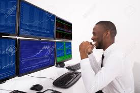 Learn the definition of 'computer broker'. Happy Young Male Borse Broker Blick In Die Diagramme Auf Mehreren Computer Im Buro Lizenzfreie Fotos Bilder Und Stock Fotografie Image 61135093