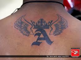 What to know before getting your first tattoo. Crazy Ink Tattoo Studio On Twitter Alphabet Wings And Crown Tattoo On Back Neck Done At Crazyink Tattoo Studio Raipur Wingstattoo Crowntattoo Alphabettattoo Necktattoo Ink Crazyink Creativity Raipurartist Https T Co Kvaufpuhab