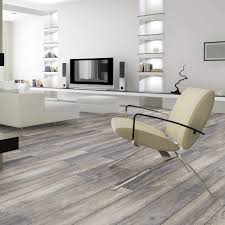 Boasting a rich dark hue and lively swirling grain pattern, it will bring a timeless elegance to both period and modern properties while requiring minimal maintenance. Kronotex Harbour Grey Oak Laminate Flooring 10mm D3572 Deacon Jones