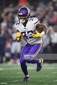 Dalvin Cook Of The Minnesota Vikings Runs With The Ball During The Minnesota Vikings Nfl Vikings Minnesota Vikings Football