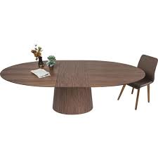 Une table ronde ou ovale offre de nombreux avantages. Contemporary Brown Extensible Table Benvenuto Kare Design