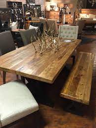 Concrete in the dining room? Wesling Table Industrial Metal Bases Are Topped With Rich Thick Slabs Of Sustainable M Coffee Table Farmhouse Ashley Furniture Dining Mango Wood Dining Table