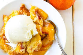 Peach Dump Cake The Easiest 4 Ingredient Peach Dessert Fresh Peaches A Touch Of Sugar French Vanilla Cake Mix Peach Dump Cake Dump Cake French Vanilla Cake