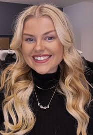 At first I regretted painting her hair blond but it's growing