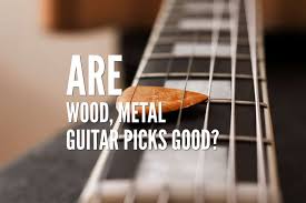 How to hold the guitar pick. Are Wood Metal Guitar Picks Good Things To Know Before Buying One Rock Guitar Universe