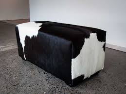 This Deep Black And White Cowhide Ottoman Is Perfect For A Walk In Wardrobe From Gorgeous Creatures Www Gorgeouscrea Cowhide Ottoman Ottoman Furniture Ottoman