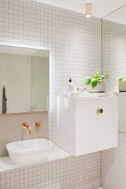 Remake a stock vanity with a coat of navy paint and gold hardware. 30 Bathroom Decorating Ideas On A Budget Chic And Affordable Bathroom Decor