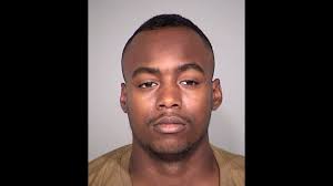 Robbery suspect slips handcuffs, steals and crashes police car