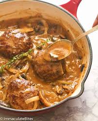 Oven baked easy hamburger steak recipes, baked low and slow, with options for caramelized onion, mushroom sauce or wine sauce. Hamburger Steak And Gravy Immaculate Bites