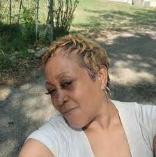 CNA of the Month, Mrs.Lisa Oliver, Lisa has been employed at Henderson  Health and Rehab for 40 years showing dedication and love throughout the  facility, grooming and loving her residents always making