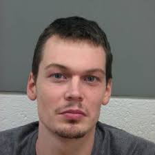 Iowa man charged with shooting randomly at occupied vehicle