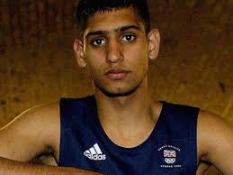 Berita Olahraga Tinju: Amir Khan mengklaim gelar juara dunia