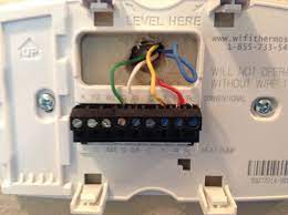 After you set the program for the heating or cooling season, you never take away your old thermostat, but leave the wallplate with the wires attached. Installing Of Honeywell Wi Fi Programmable Thermostat Home Improvement Stack Exchange