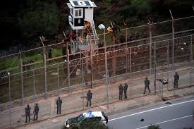 The migrants, some 1,500 of whom turned out to be minors, flocked into ceuta from both north and south, bypassing its border fences through sea approaches, as they walked. Two Cops Injured As 400 Migrants Storm Border Fence In Spanish North African Enclave Of Ceuta