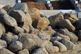 Natural rocks that transition well throughout multiple outdoor spaces due to their various sizes and colors, including white stones. Landscaping Stones Decorative Rock And Granite Rocks Quartizite Large Selection