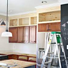 This is a favorite because you can never have enough cookbooks and you can get creative by strategically places your books based on color to brighten up your space. Six More Awesome Design Ideas That Took My Breath Away The Lettered Cottage Kitchen Cabinets To Ceiling Upper Kitchen Cabinets Above Kitchen Cabinets