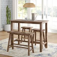 Clean And Contemporary Yet Warm And Rustic This Four Piece Pub Table Set Anchors Your Dining Space In A Casual In 2020 Pub Table Sets Solid Wood Dining Set Pub Table