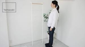 With a focus on organization this ladder will seamlessly ingratiate itself to you and your home. Tower Leaning Ladder Hanger Yamazaki Home Youtube