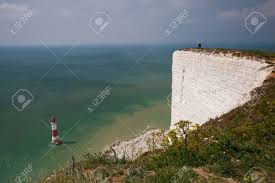A mother who threw herself off a cliff at the same time her daughter's body was found at home left a cathy madden was found at the bottom of the seven sisters cliffs, near birling gap, eastbourne, on. White Chalk Cliffs And Aerial View Lighthouse Beachy Head Eastbourne Stock Photo Picture And Royalty Free Image Image 47410477