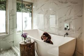 Contemporary white master bathroom with marble floors. Daltile Ceramic Porcelain Tile For Flooring Walls More