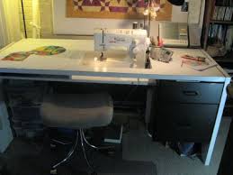 A Large Desk Into A Sewing Table She Mounted A Power Strip Under The Desk For Easier Access With Images Sewing Machine Tables Diy Sewing Table Sewing Room Inspiration