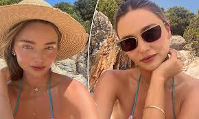 Miranda Kerr stuns in a skimpy bikini during beachside getaway 