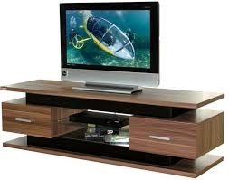 Meja tv adalah furniture atau perabot yang utama, karena di setiap ruang tamu pasti terdapat televisi dan tentunya ruangan anda akan lebih baik jika tv anda diletakkan diatas meja yang telah didesain khusus untuk diletakkan televisi. Rak Tv Minimalis Sederhana Desain Gambar Foto Tipe Rumah Minimalis Desain Gambar Foto Tipe Rumah Minimalis