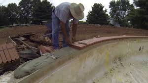 There are many companies ready to implement this task. Install Tile Coping Pool Remodel Just Mixed A Batch Of Mud