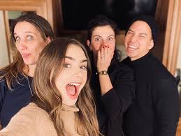 Her father is english musician phil collins, while her mother, jill tavelman, who is from los angeles, california, was president of the beverly hills women's club for three terms.lily moved with her mother to la at the age of five, after her parents split up. Lily Collins