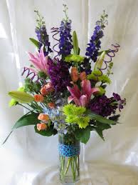 There are many florists that allow for same day delivery if you order online. Tiffany Purple Lily Flower Arrangement