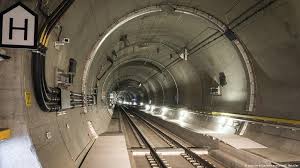 The gotthard base tunnel, with a length of 57.09 km (35.47 mi) and a total of 151.84 km (94.3 mi) of tunnels, shafts and passages, is the longest railway tunnel in the world, with a geodetic distance of 55.782 km (34.661 mi) between the two portals. The World S Longest Rail Tunnel The Gotthard Base Tunnel Dw Travel Dw 30 05 2016