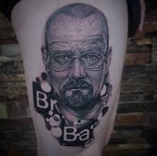 Who is a good tattoo artist for photo realism in Red Deer?
