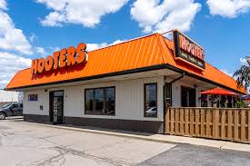 Hooters Imagens Y Vectores Premium Do Istock