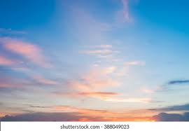 Blue sky with puffy clouds. Sunset Sky Background Stock Photo Edit Now 388049023