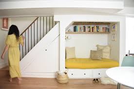 A Bright Basement Transformation Cozy Reading Nook Turntable Kitchen Cozy Reading Nook Reading Nook Under Stairs Nook